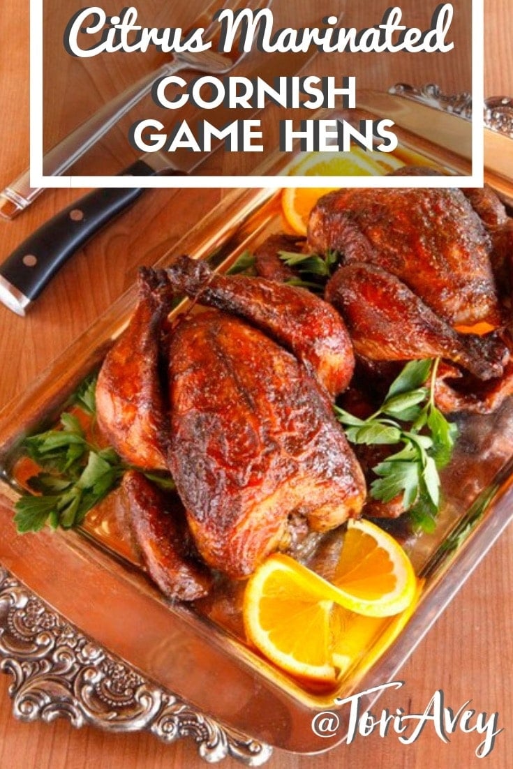 Marinated Cornish Game Hens with Citrus and Spice - Cornish game hens marinated with orange juice and spices for an aromatic and impressive entree. Lightly sweet and spiced with a hint of citrus. #cornishgamehens #orange #citrus #holidayrecipes #entree #easyandimpressive