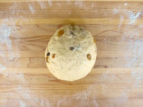 Raisins kneaded into bread dough.