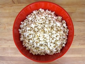 Large bowl of popped popcorn.