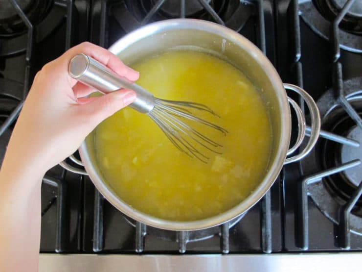 Whisking potato leek soup.