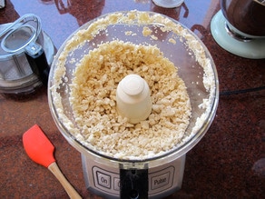 Bananas processed to crumbs in the food processor.