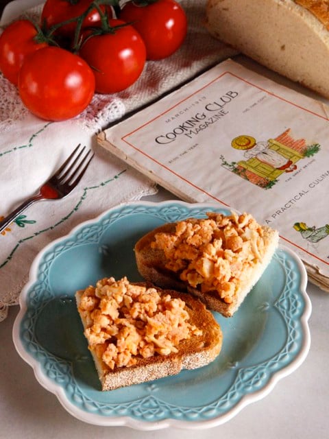 Tomato Egg Scramble - Recipe for Tomato Egg Scramble with butter and crackers on toast from a 1913 cooking magazine called Cooking Club. Simple breakfast dish.