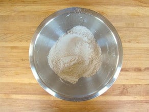 Flour sifted into a mixing bowl.