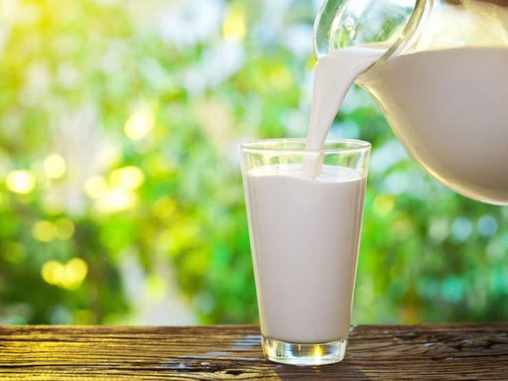 Milk poured on a glass