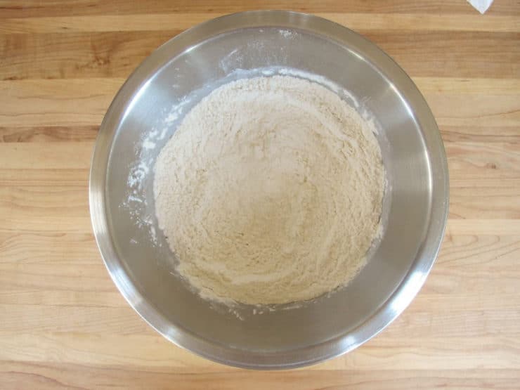 Flour and dry cake ingredients in a mixing bowl.