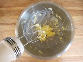 Beating butter with a mixer until smooth.