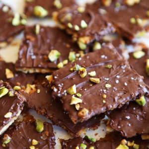 A close up portrait shot of Chocolate Toffee Matzo Crunch with Pistachios & Sea Salt