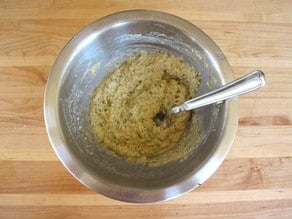 Mixing matzo ball dough in a bowl.