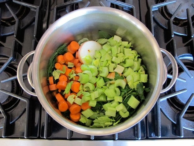 Diced vegetables in a stockpot.