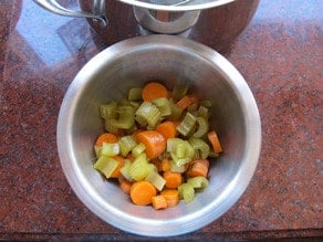 Cooked, diced vegetables in a bowl.