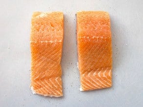 Raw salmon filets.