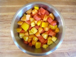 Large bowl of diced melon.