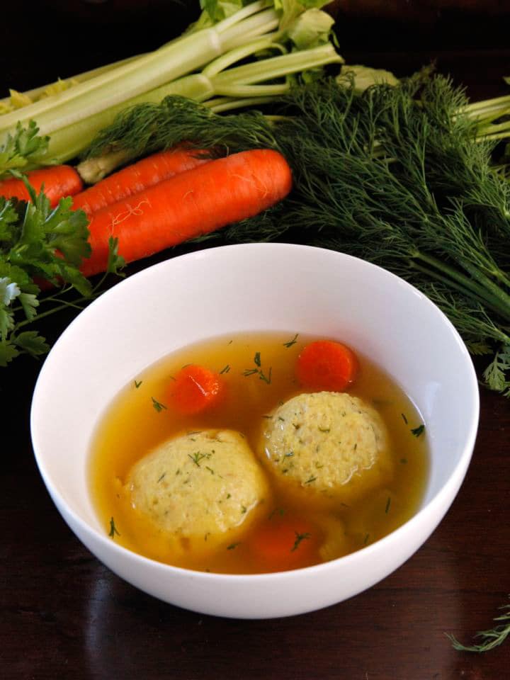 Vegetarian Matzo Ball Soup - One secret ingredient makes this the ultimate meatless matzo ball soup! Savory chicken flavor without the meat. Kosher for Passover recipe.