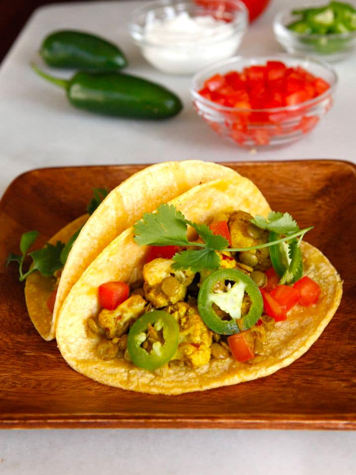 Vegan Lentil Cauliflower Tacos - This savory meatless taco recipe with lentils and cauliflower can be made vegan and gluten free. Healthy vegetarian meal for Cinco de Mayo.