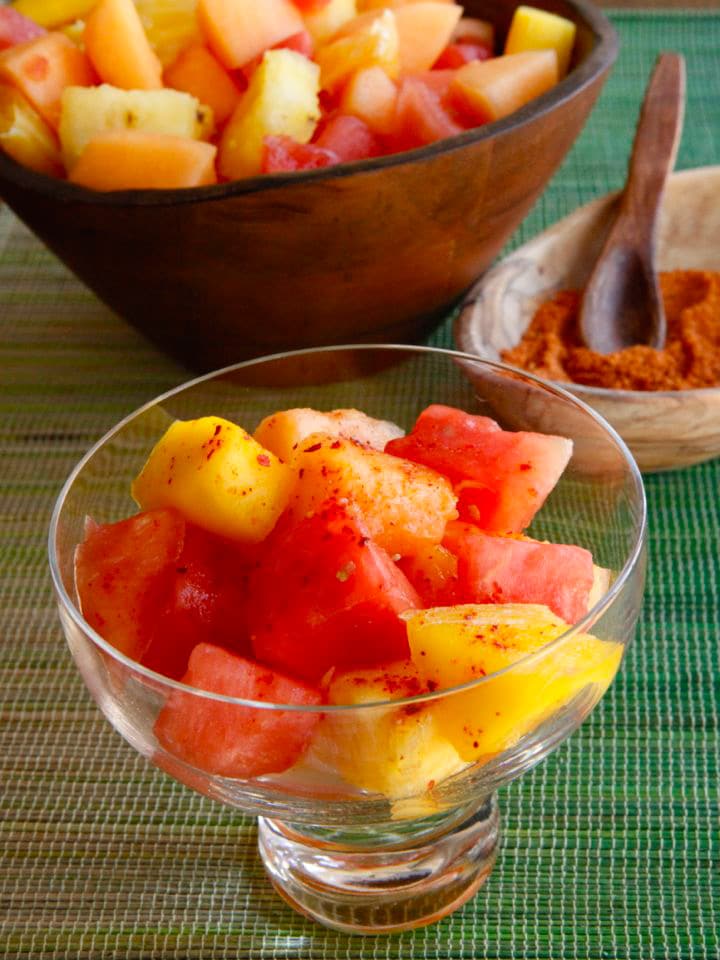 Ensalada de Frutas con Chile - A spicy Mexican fruit salad recipe with salt, lemon and chile de árbol. Cinco de Mayo or summer salad.