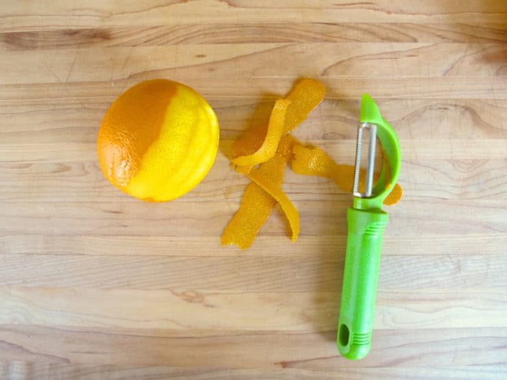 Peeling oranges.