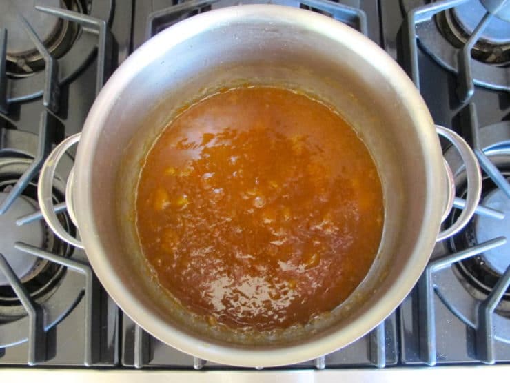 Rhubarb marmalade boiling.