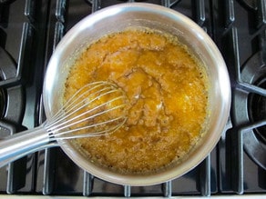 Boiling toffee on the stove.