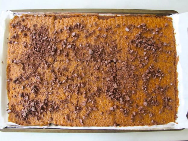 Chocolate sprinkled over hot toffee matzo.