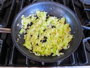 Minced celery and onion in a skillet.