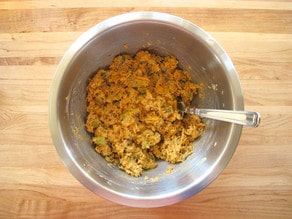 Salmon cake mixture in a mixing bowl.