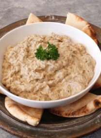 Creamy Baba Ghanoush - Recipe for luscious Middle Eastern roasted eggplant dip, rich with sesame tahini. Healthy and tasty!