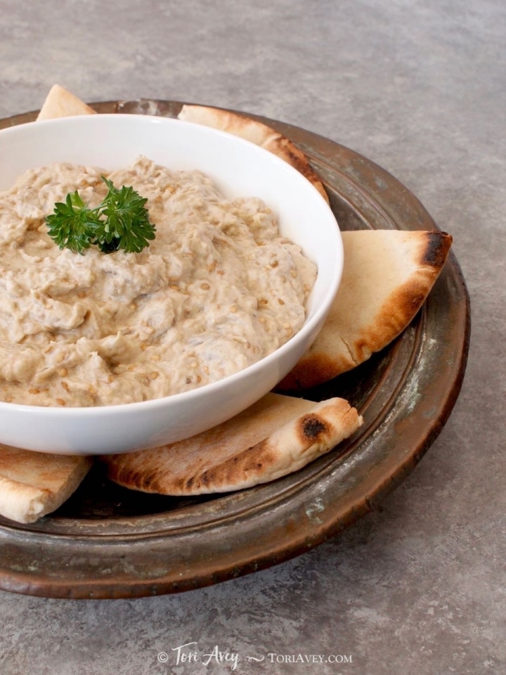 Creamy Baba Ghanoush - Recipe for luscious Middle Eastern roasted eggplant dip, rich with sesame tahini. Healthy and tasty!