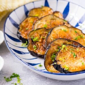 Plate of fried eggplant cooked golden crisp