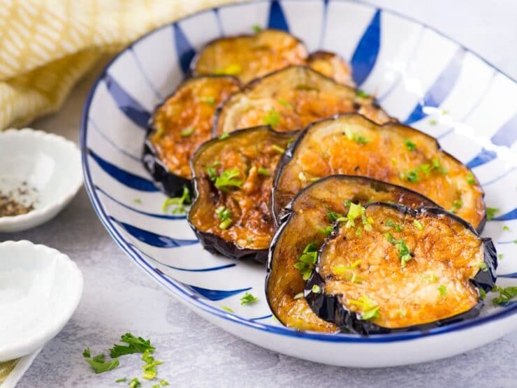 Plate of fried eggplant cooked golden crisp