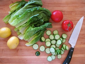 Various chopped vegetables on a cutting board.