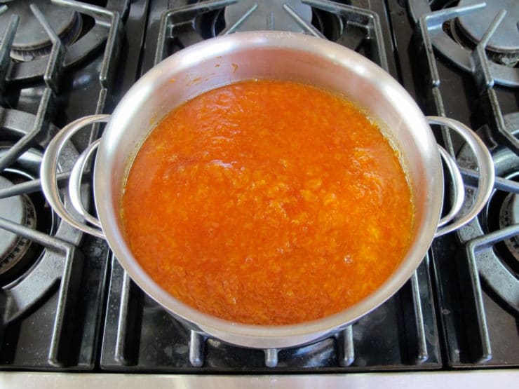 Milled peaches cooking down into preserves.