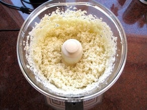 Cauliflower riced in a food processor.