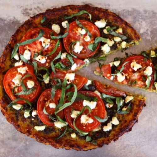 Tomato Basil Tart with Pesto, Goat Cheese and Cauliflower Crust - Gluten Free Recipe by Tori Avey