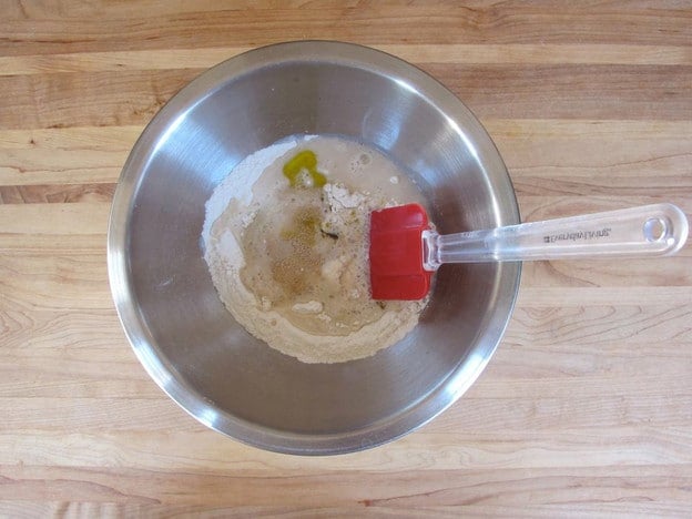 Flour and yeast in a mixing bowl.
