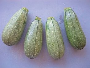 4 light green zucchinis.