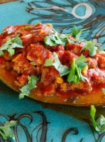 Recipe for Stuffed Zucchini with ground beef or lamb, pine nuts, tomato sauce and spices. Low carb, paleo, grain free.