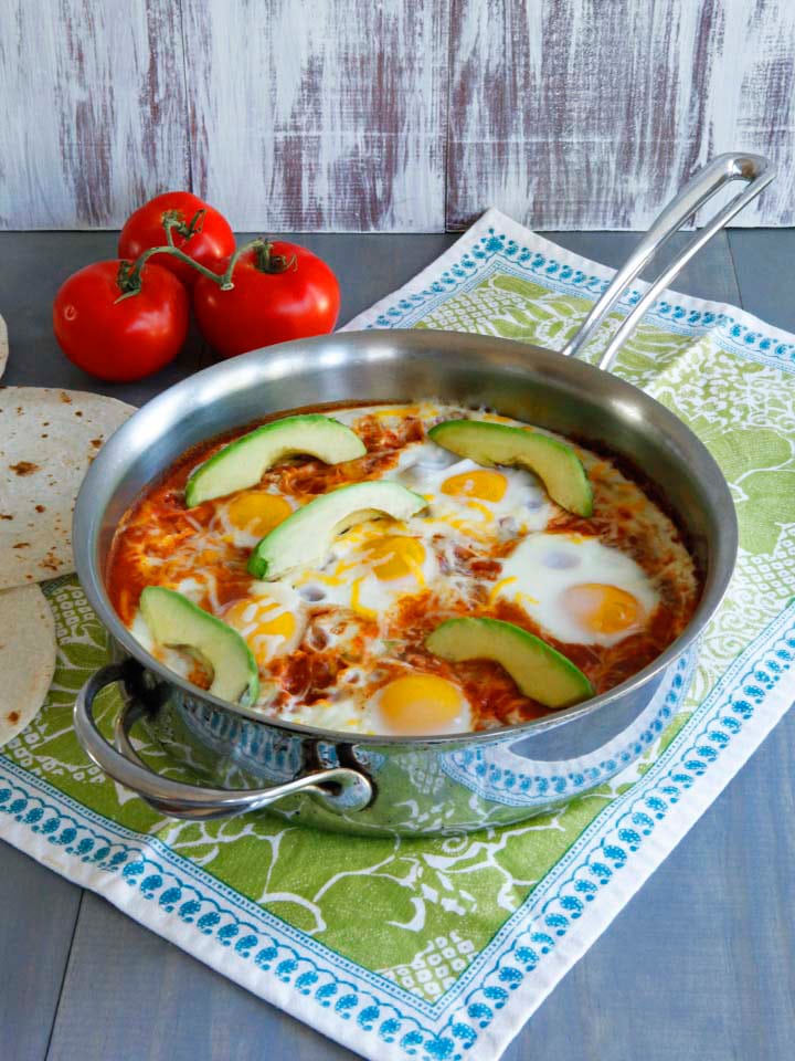 Huevos Shakshukos, Shashuka Recipe with a Mexican Twist - Two tasty egg dishes from two different parts of the world unite to make one tasty spiced-up breakfast dish. Gluten free, vegetarian, healthy.