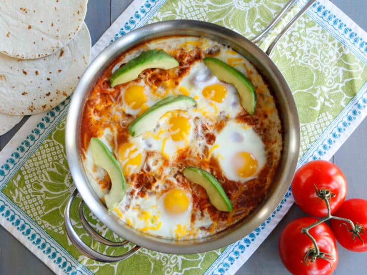 Huevos Shakshukos, Shashuka Recipe with a Mexican Twist - Two tasty egg dishes from two different parts of the world unite to make one tasty spiced-up breakfast dish. Gluten free, vegetarian, healthy.