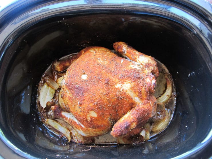 Whole chicken cooked in slow cooker.