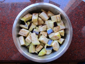 Diced eggplant tossed with olive oil.