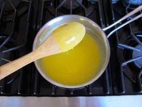 Egg yolks, sugar, and butter in a saucepan.