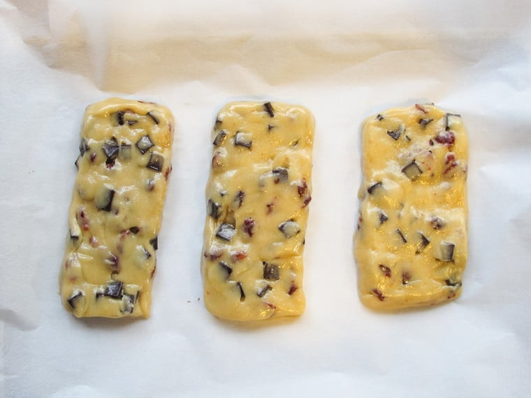 Dark Chocolate Cherry Mandelbrot mixed lined and laid out on a baking sheet