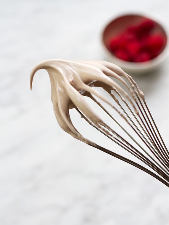 Stiff meringue on a whisk.