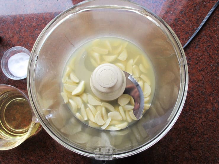 Garlic and water in food processor.