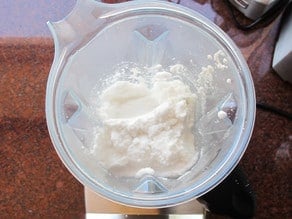 Coconut pulp in blender.