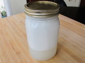 Coconut milk separated in a canning jar.