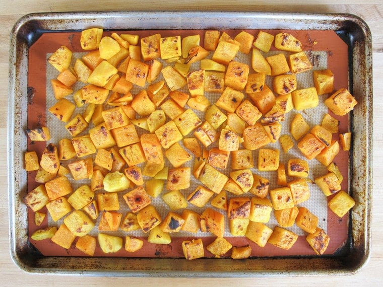 Roasted butternut squash on baking sheet