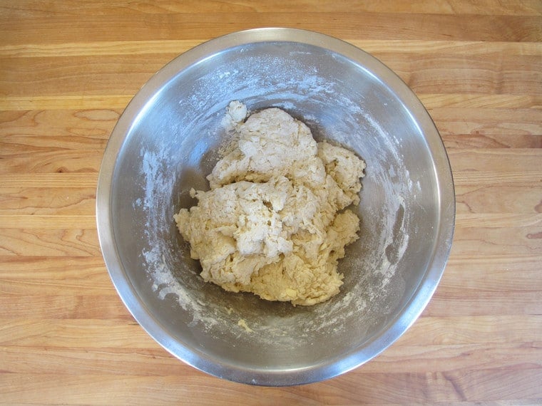 Loose biscuit dough in a bowl.