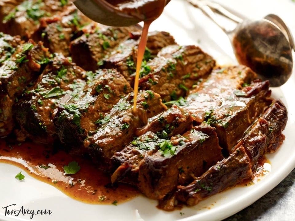 Savory Slow Cooker Brisket - Recipe with Video. Brisket Recipe with Onion, Garlic and Spices Made in the Crock Pot. Kosher for Passover.