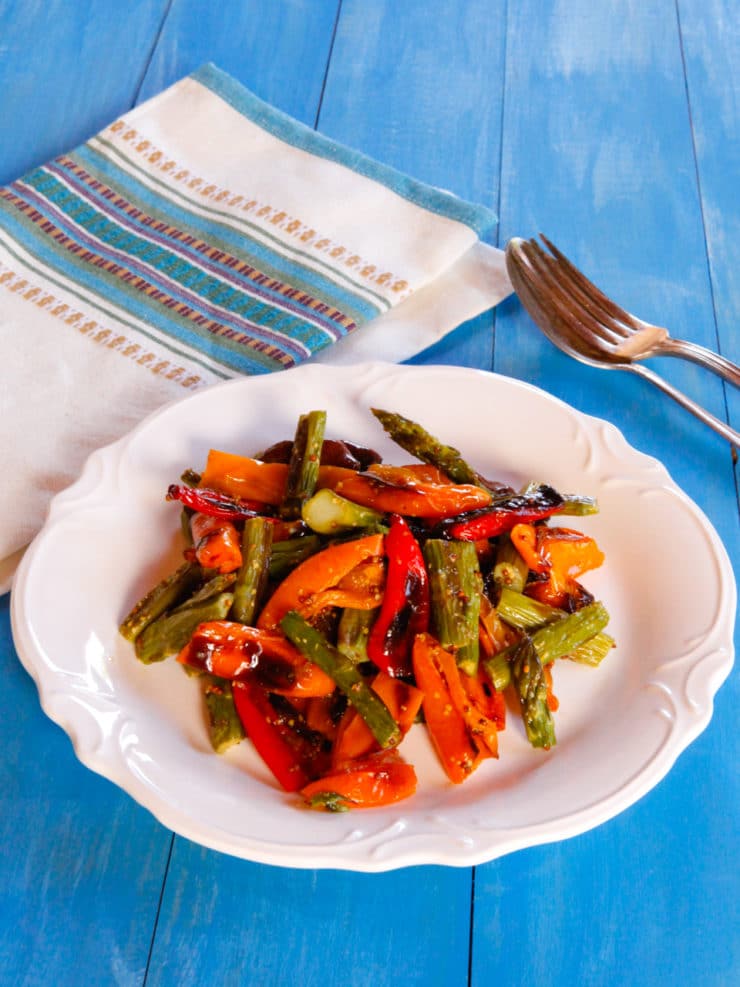 Roasted Sweet Mini Peppers and Asparagus - Roasted asparagus and sweet roasted mini peppers with a delicious simple dressing. Easy, healthy, flavorful and colorful vegan side dish.